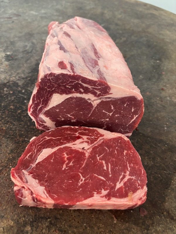 Thick-cut scotch fillet on the block
