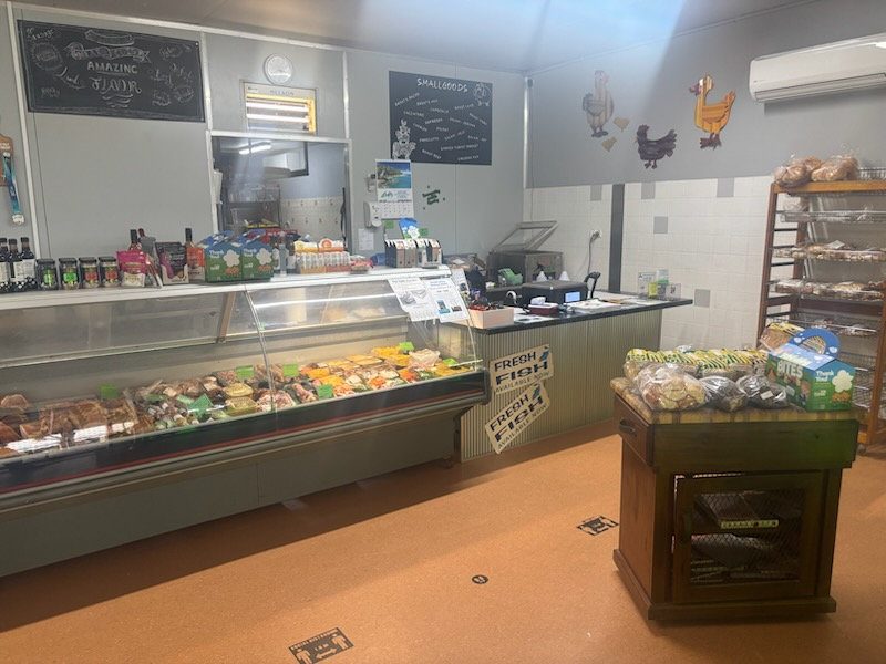 Inside the shop: the meat cabinet and pantry shelves